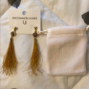 Uncommon James never worn earrings